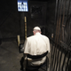 Inside the underground cell of a Polish Catholic priest, Maximillian Kolbe, who sacrificed his life for another prisoner who was set to be executed.